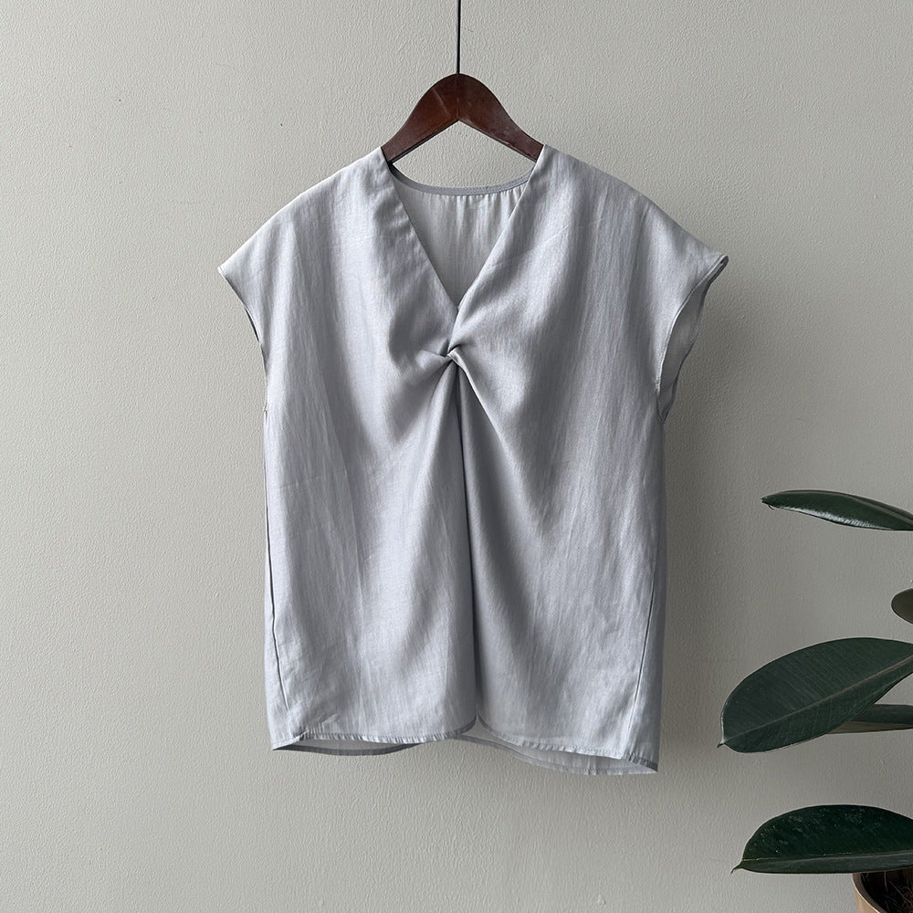 Damer afslappet knapdetaljer T-shirt med V-hals og løs pasform Stilla