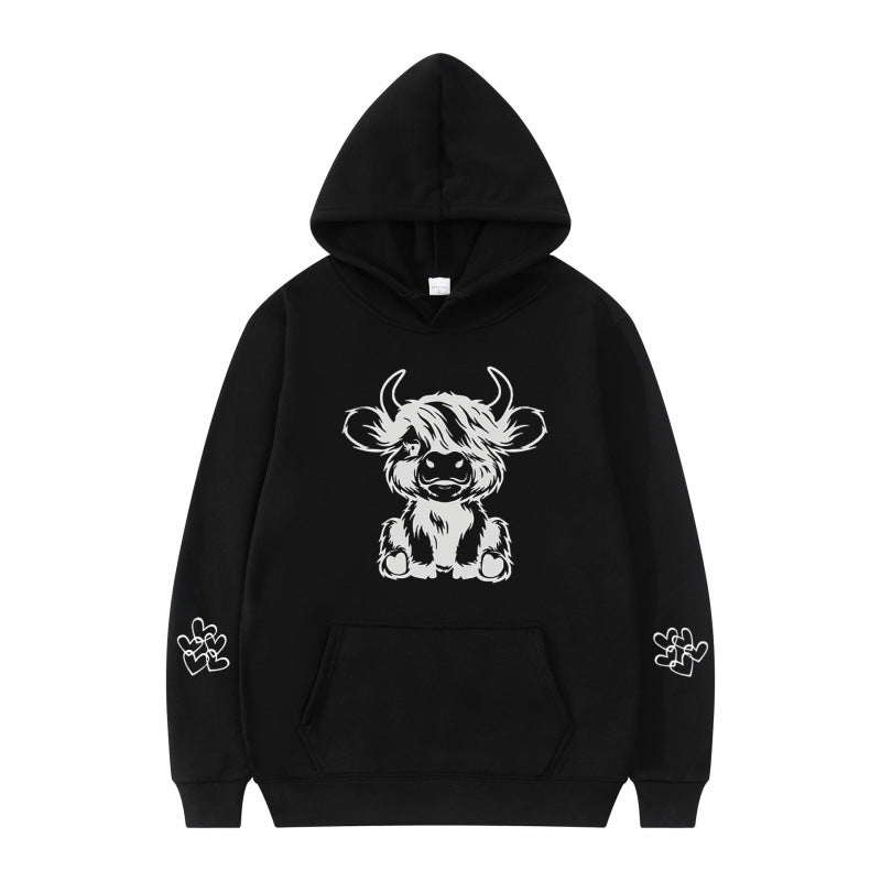 Kvindernes hætte sweatshirt med charmerende kvægmotiv og praktiske kængurulommer Skovae