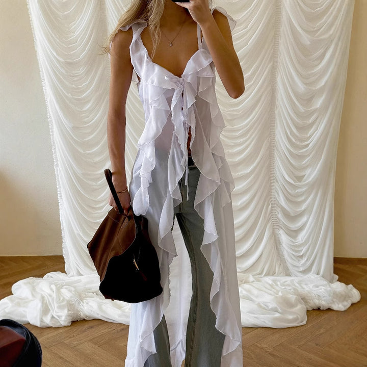 Dame Rynke-overlay-bluse med minimalistisk knaplukning og flydende snit Stilla