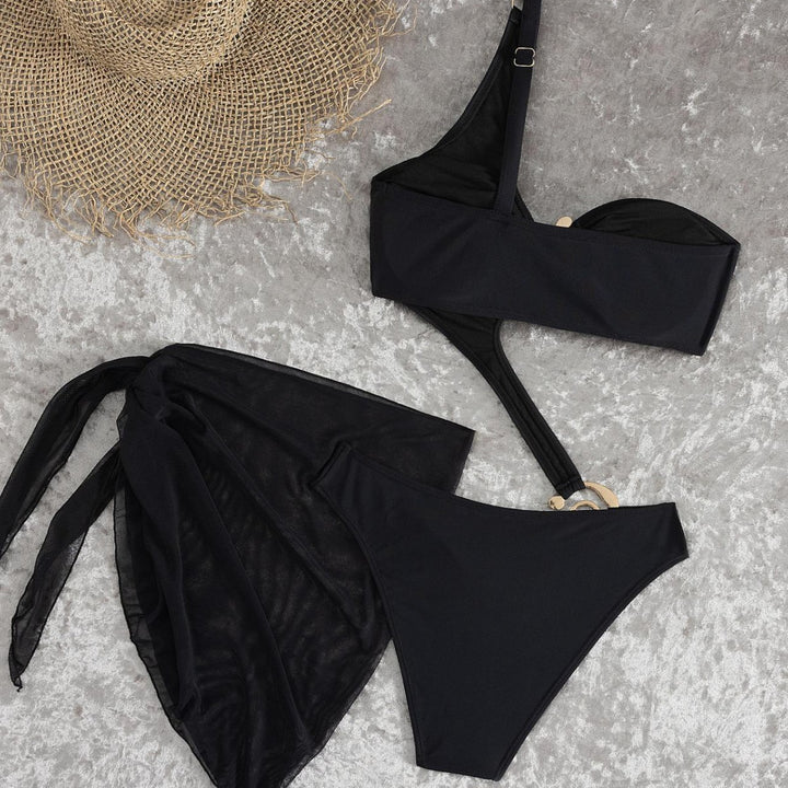 Dame Monokini med asymmetrisk design og elegant drapering Skovae