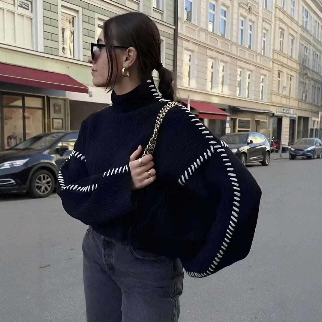 Dame fluffy strikpullover med elegant rullekrave og moderne indsatser Stilla