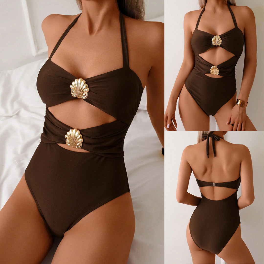 Damer Enstykke badedragt med elegant cut-out og dekorativ musling-applikation Stilla