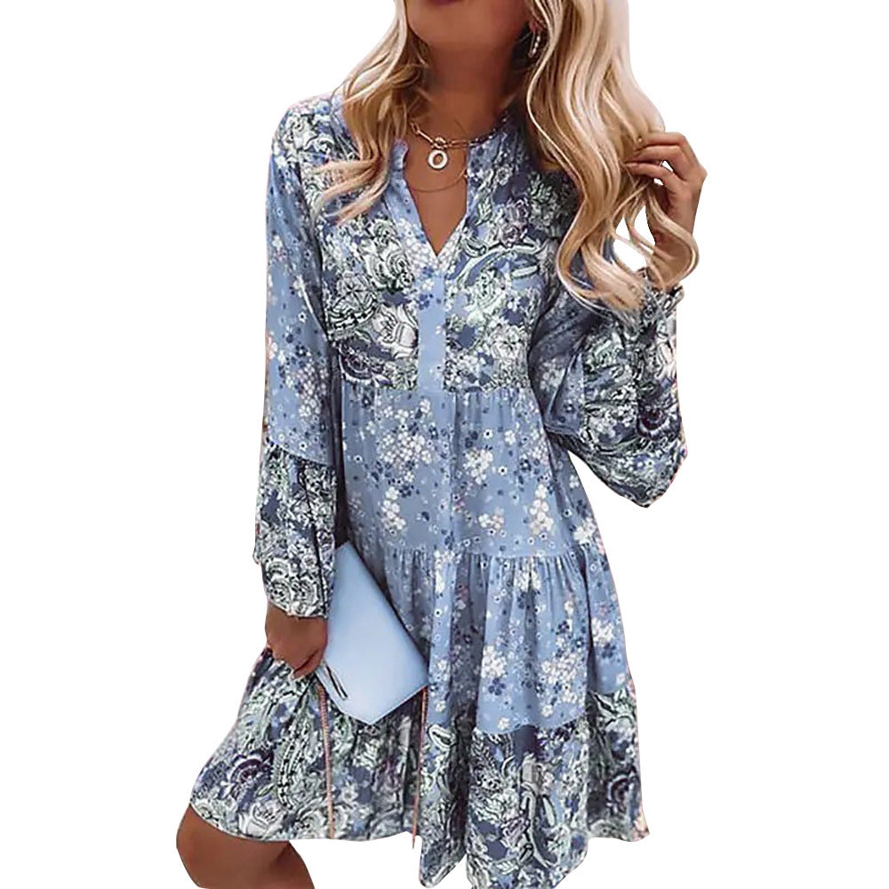 Dame fritidskjole i floral look med moderne V-udskæring og voluminøse ærmer Stilla