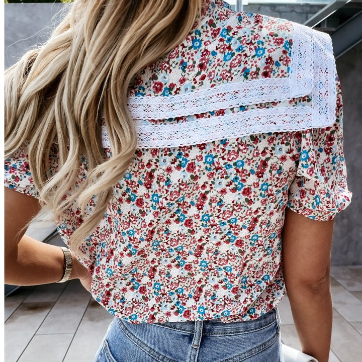 Damebluse med floraltryk og spidse detaljer Stilla