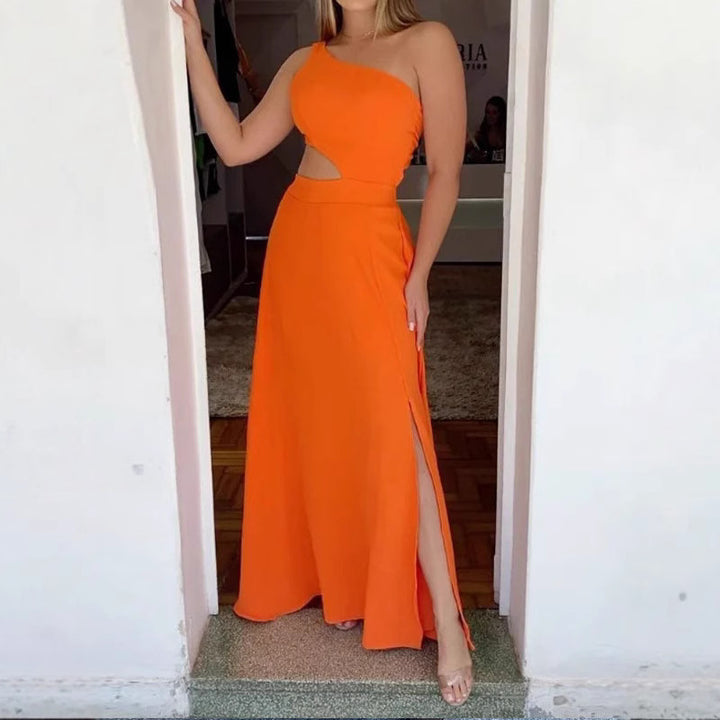 Dame Maxi-kjole med asymmetrisk udskæring og cut-out-detaljer Stilla