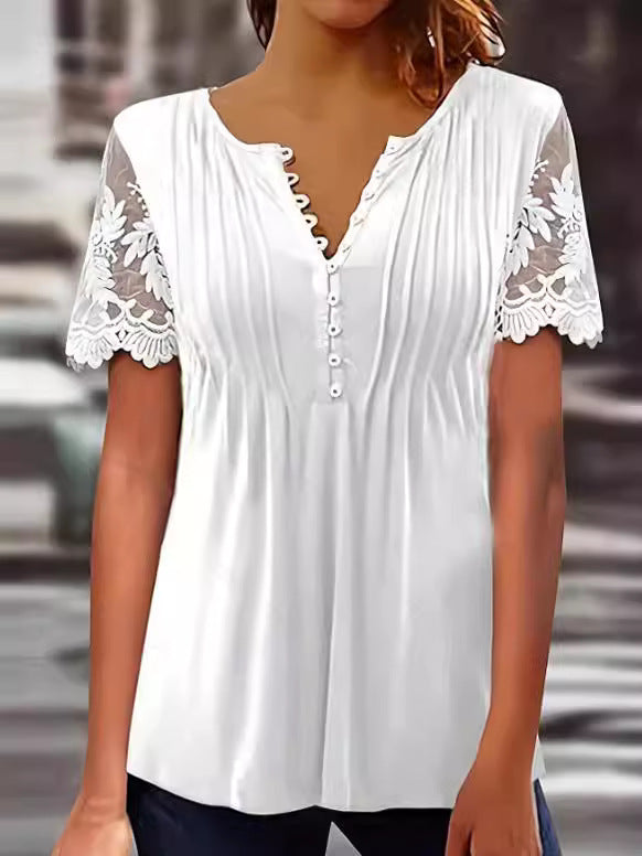 Damebluse med spidse detaljer og plissering Stilla