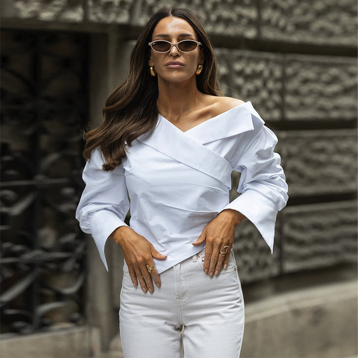 Dame smart asymmetrisk bluse med dekorativt indpakket design og puffærmer Stilla