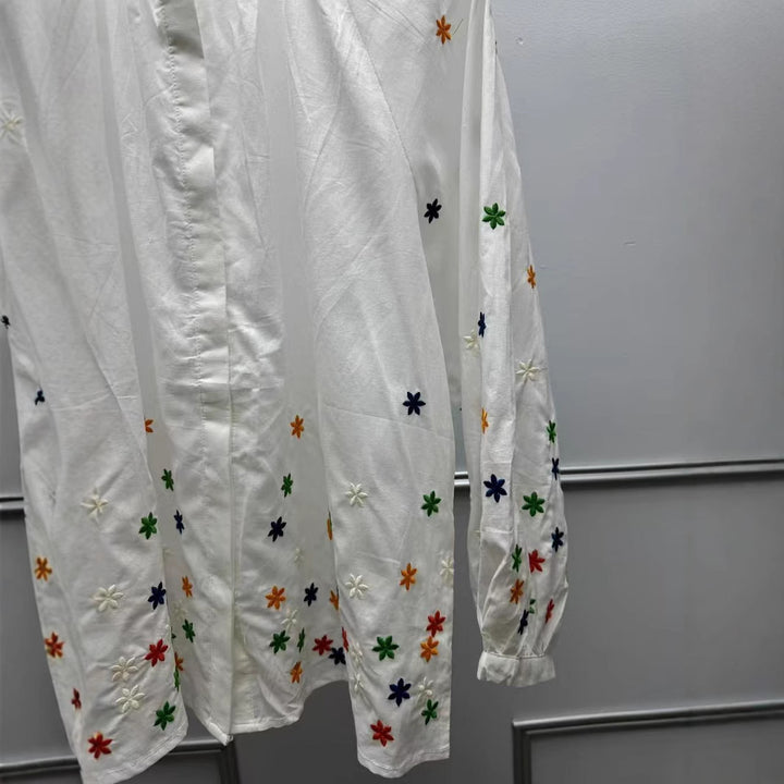 Damebluse med blomstermotiv og rynket ærme Stilla