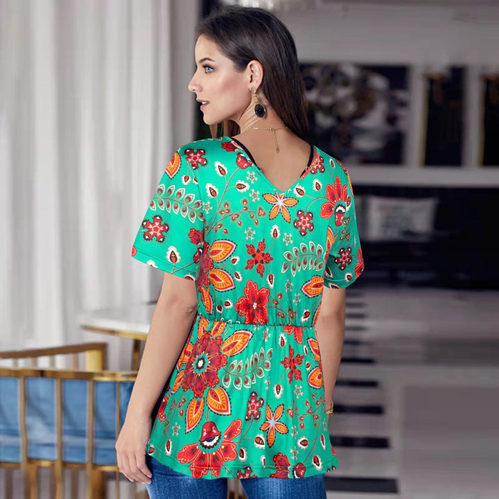 Damebluse i legende floraldesign med taljering Stilla