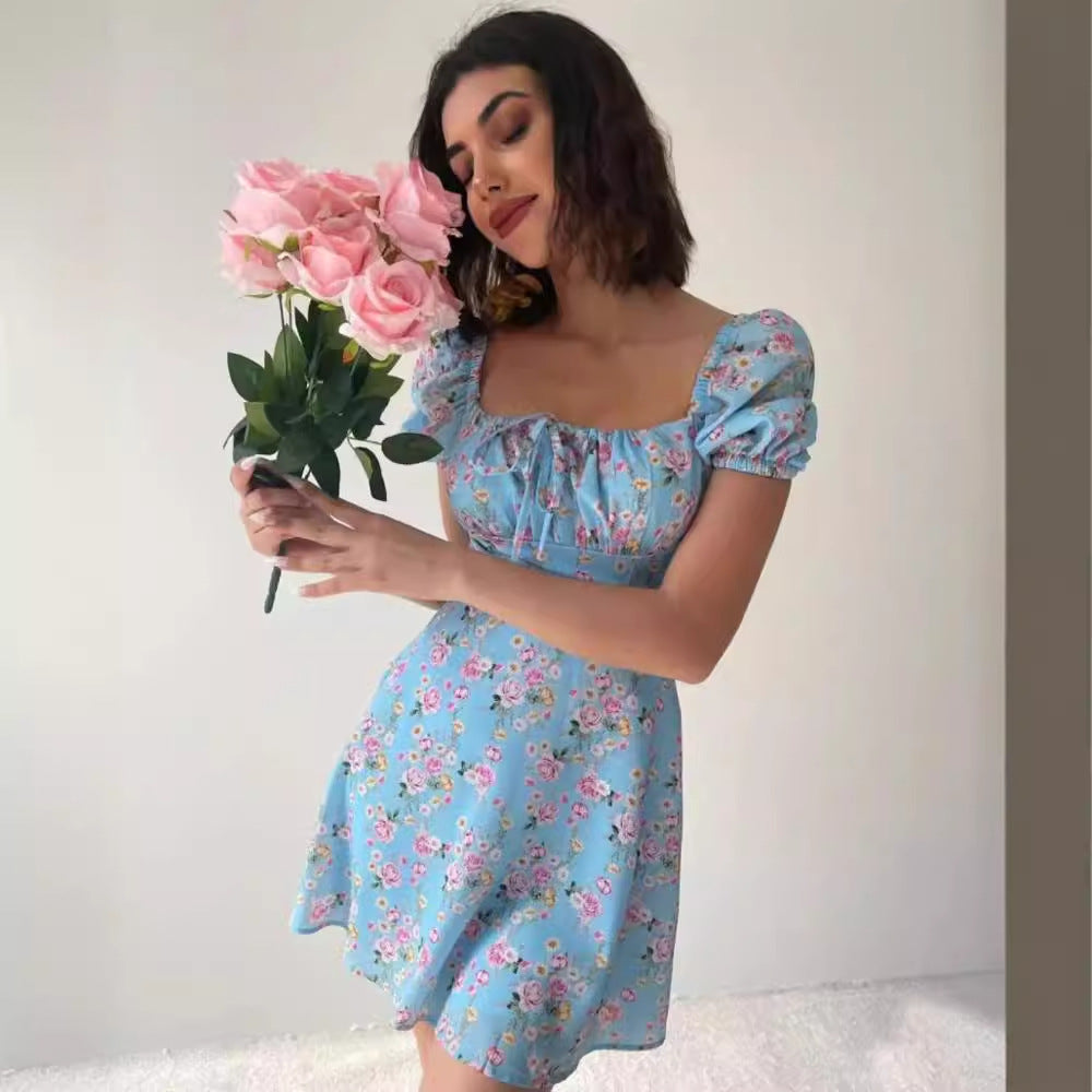 Kvinder Legesyg Minikjole med Flæsedetaljer og Blomsterprint Stilla