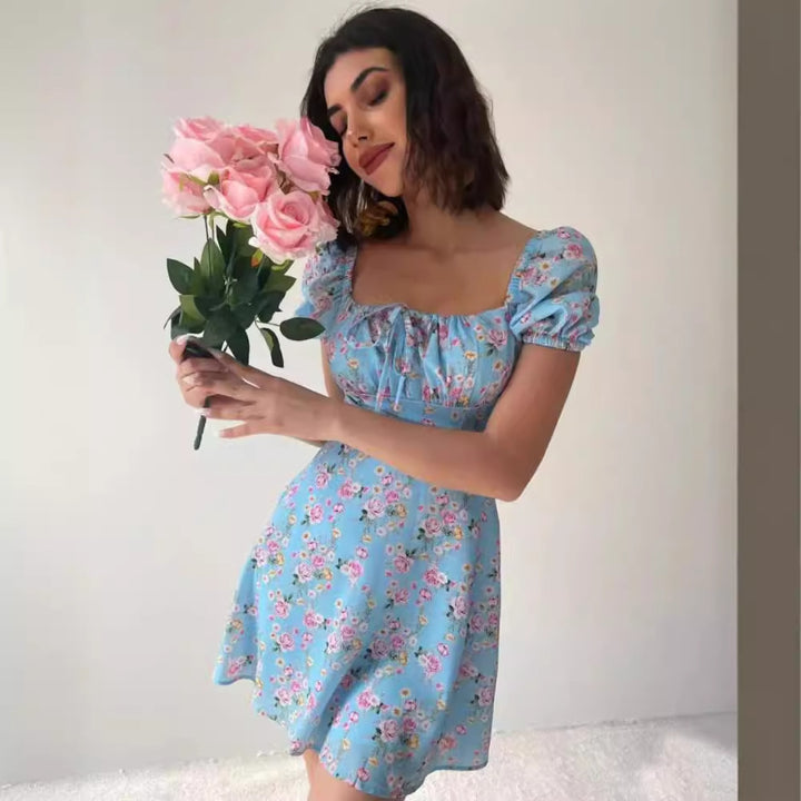 Kvinder Legesyg Minikjole med Flæsedetaljer og Blomsterprint Stilla
