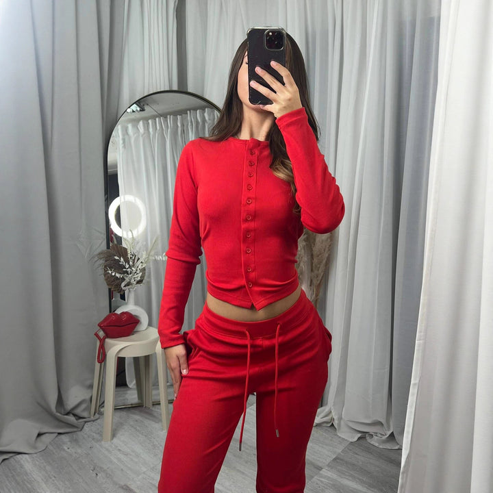 Kvindernes hyggelige strik jumpsuit med knapdetaljer og elegant design Skovae