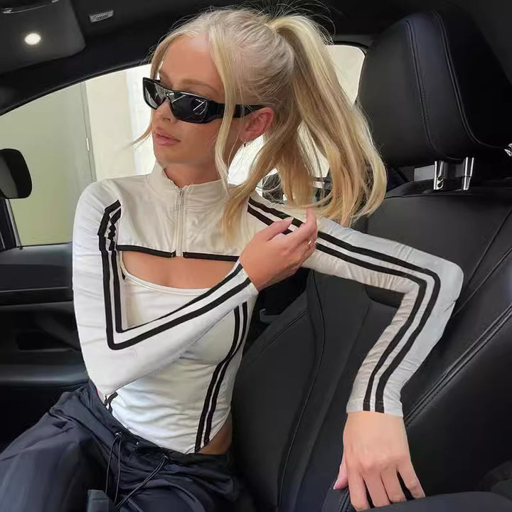 Dame Langærmet Bodysuit med kreativt Cut-Out-design og sporty accenter Stilla
