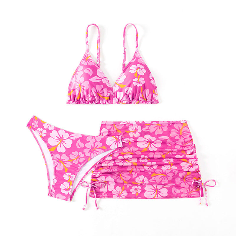 Dame bikini sæt med legesyg blomsterprint og justerbart skørt Stilla
