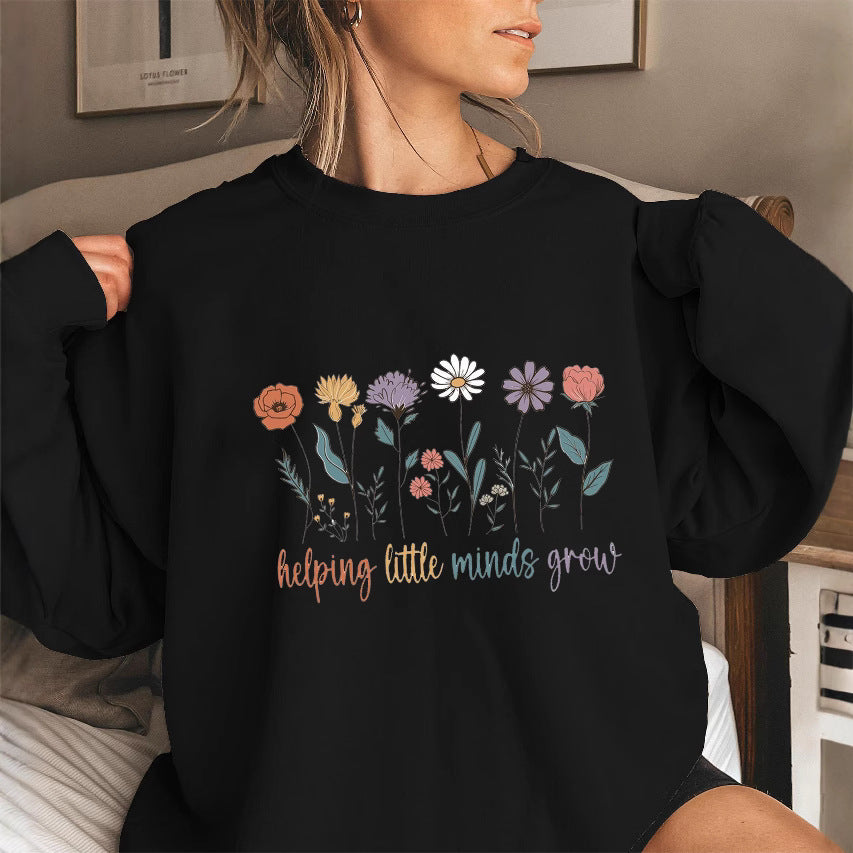 Kvinders sweatshirt med voluminøse ærmer og motiverende blomsterprint Stilla