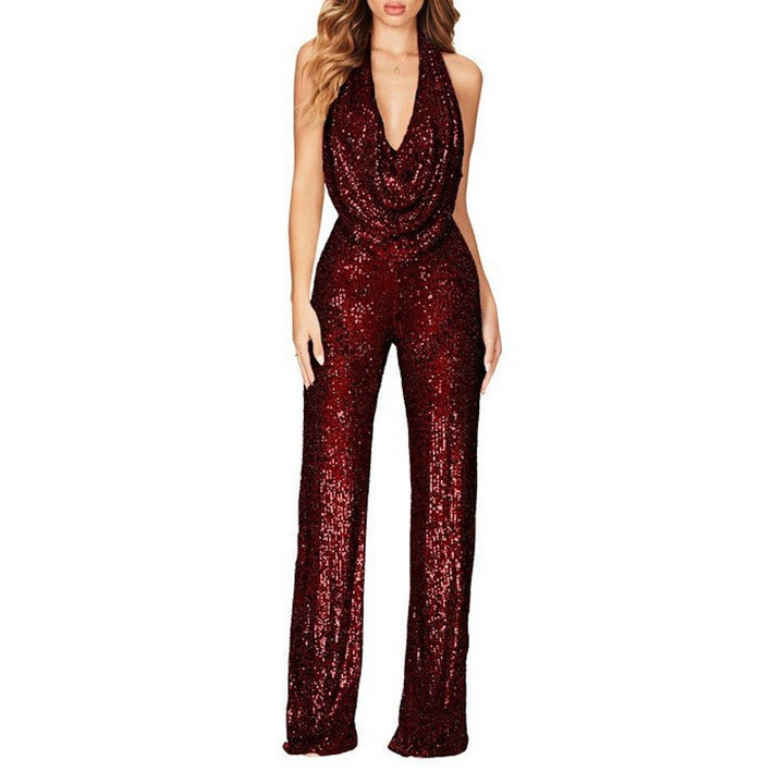 Dame glamourøs jumpsuit med glitrende pailletter og dyb udskæring Stilla