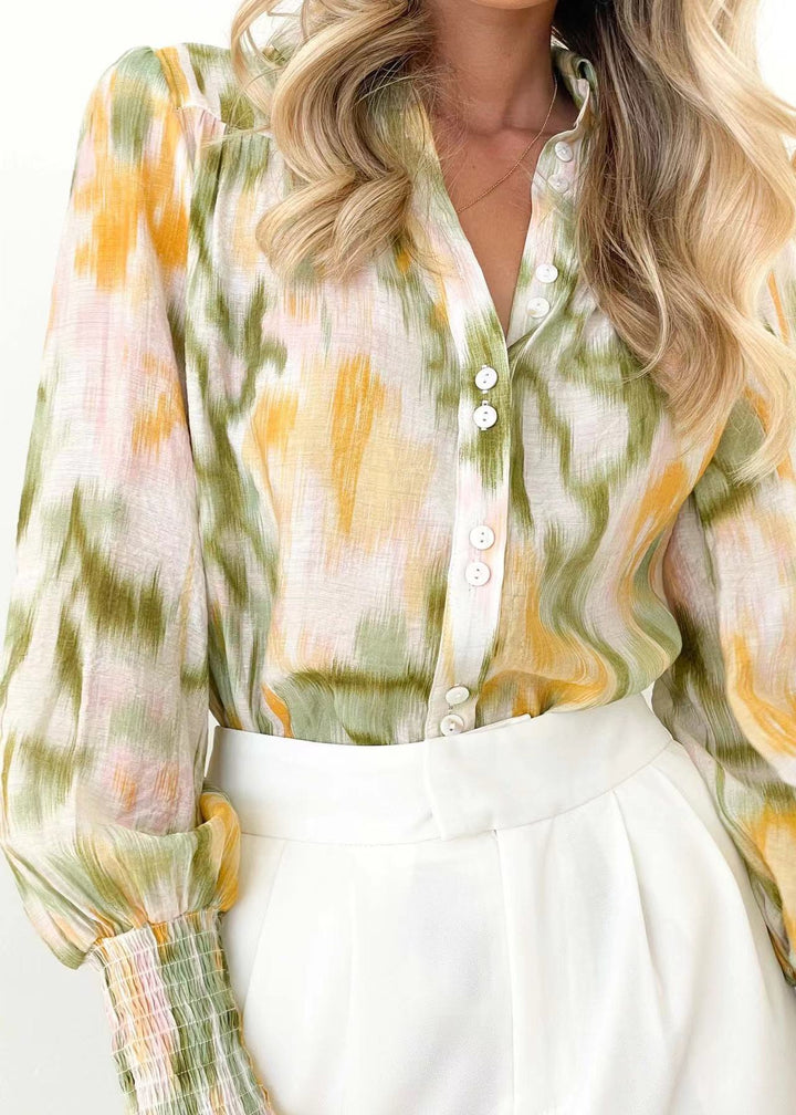 Damebluse med elegant farveovergang og trendy pufærmer Stilla