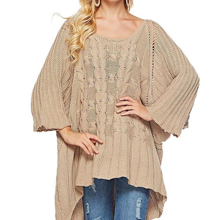 Women's chunky knit poncho with trendy cable pattern and wide sleeves Stilla