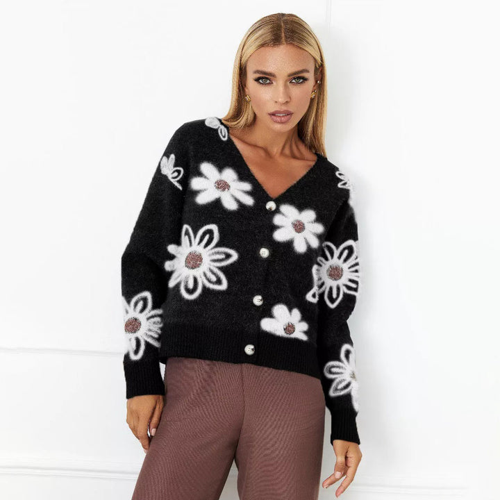 Kvindernes hyggelige cardigan med blomstermønster og knapdetaljer Stilla