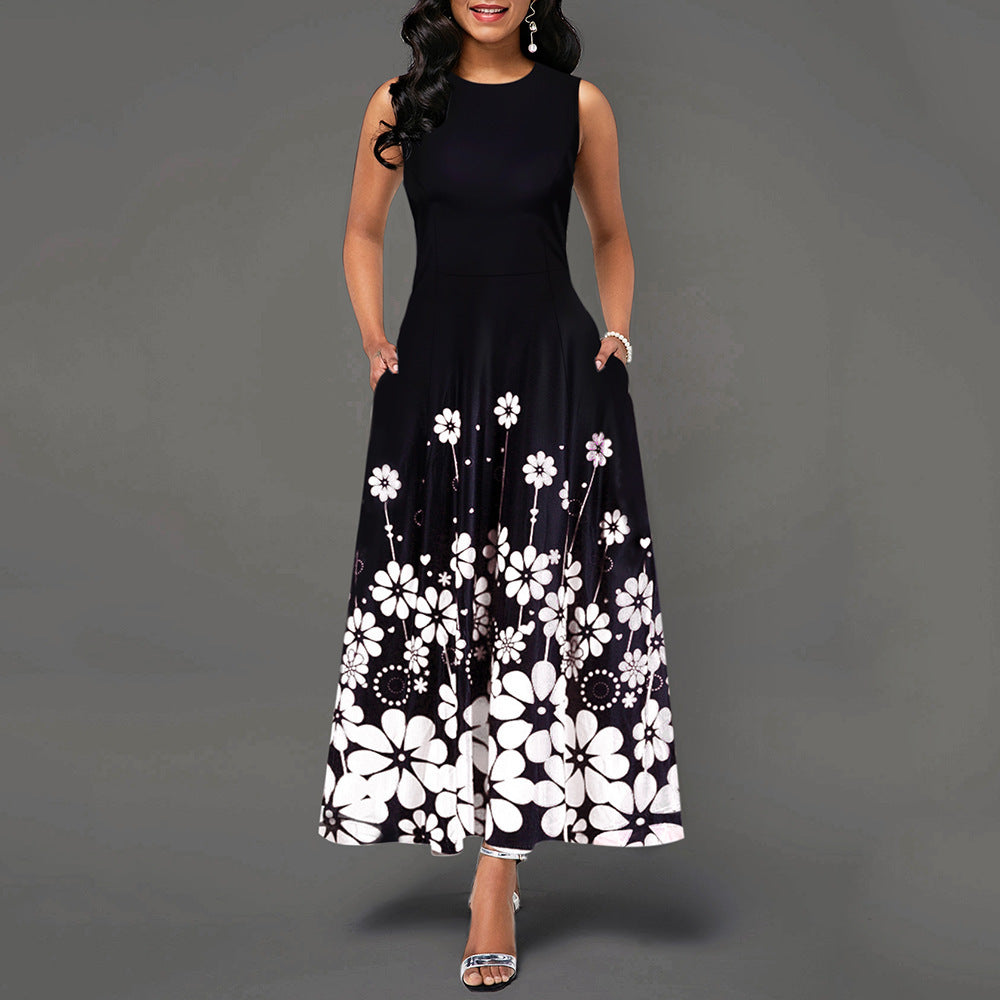 Dame maxikjole med floraltryk og elegant kant Stilla