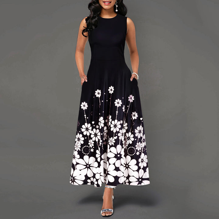 Dame maxikjole med floraltryk og elegant kant Stilla