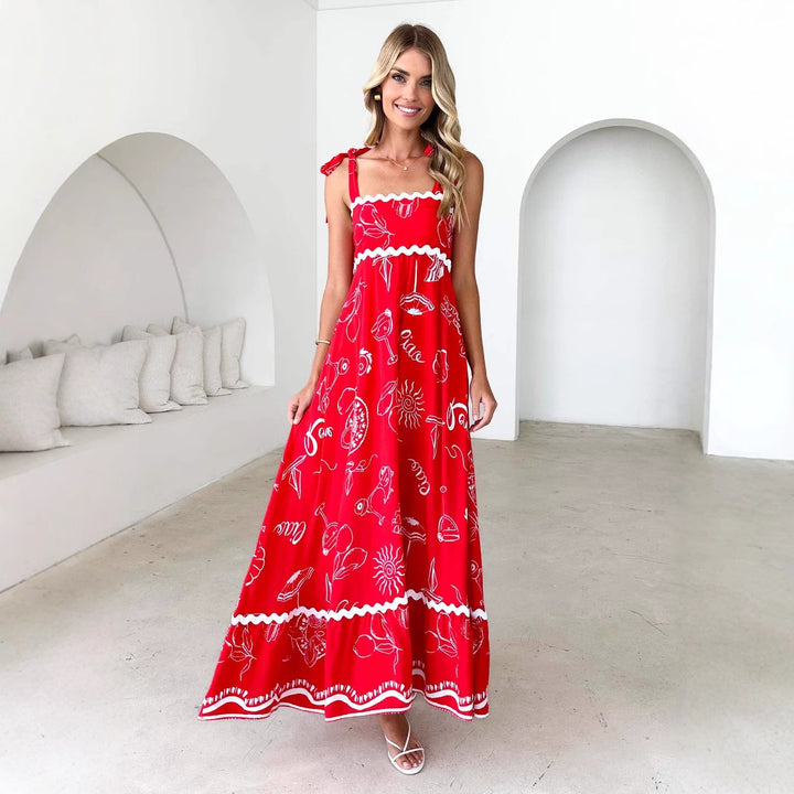 Kvinders maxi kjole med legende stropdesign og elegant print Stilla