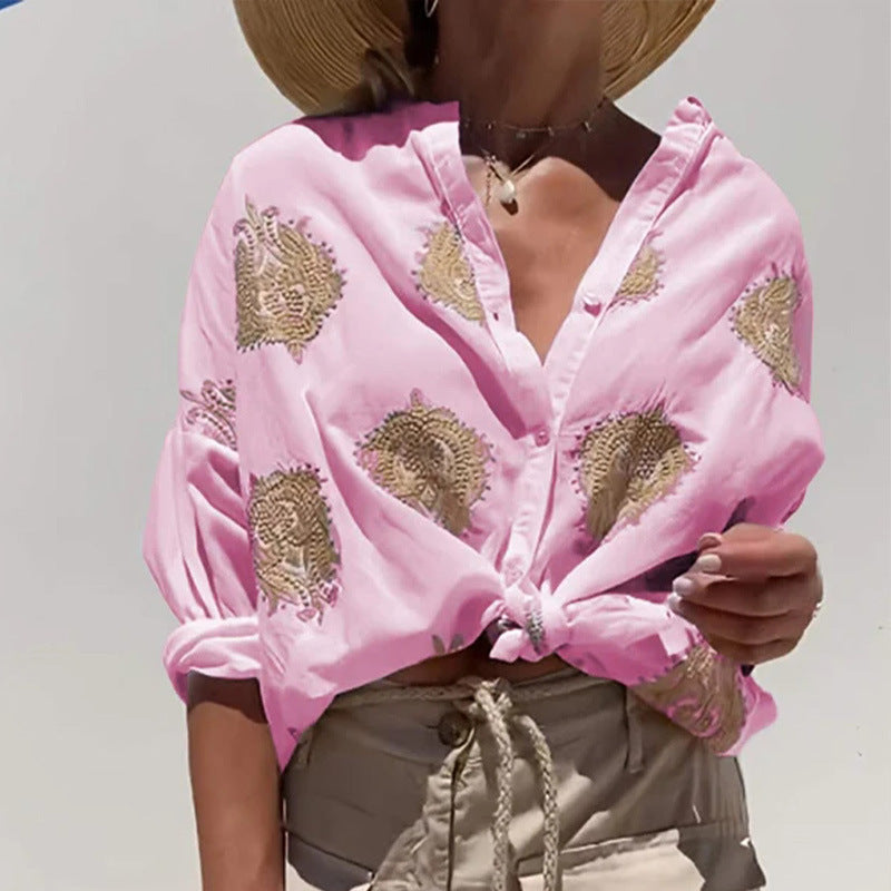 Damebluse med blomsterbroderi og ballonærmer Stilla