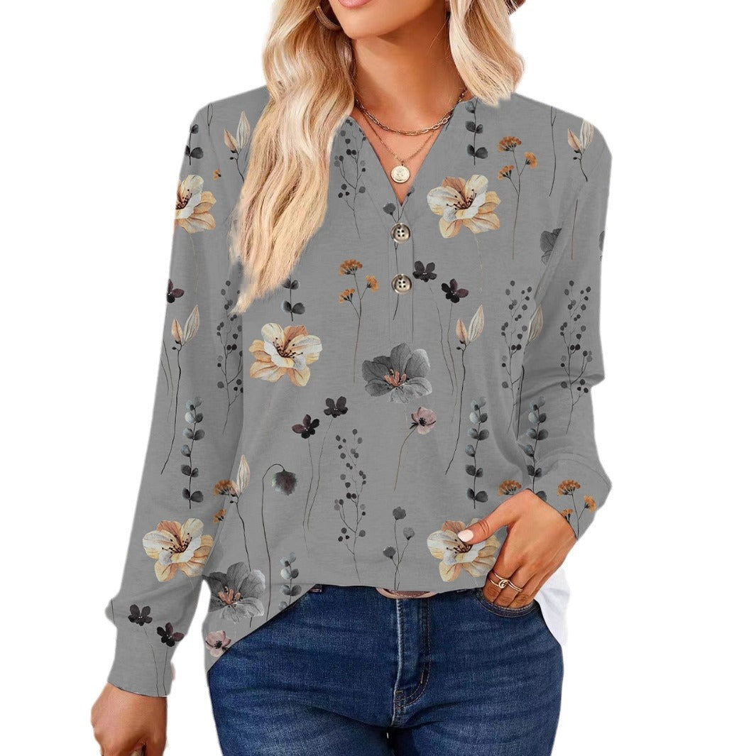 Damebluse med blomsterprint og knapdetaljer Stilla