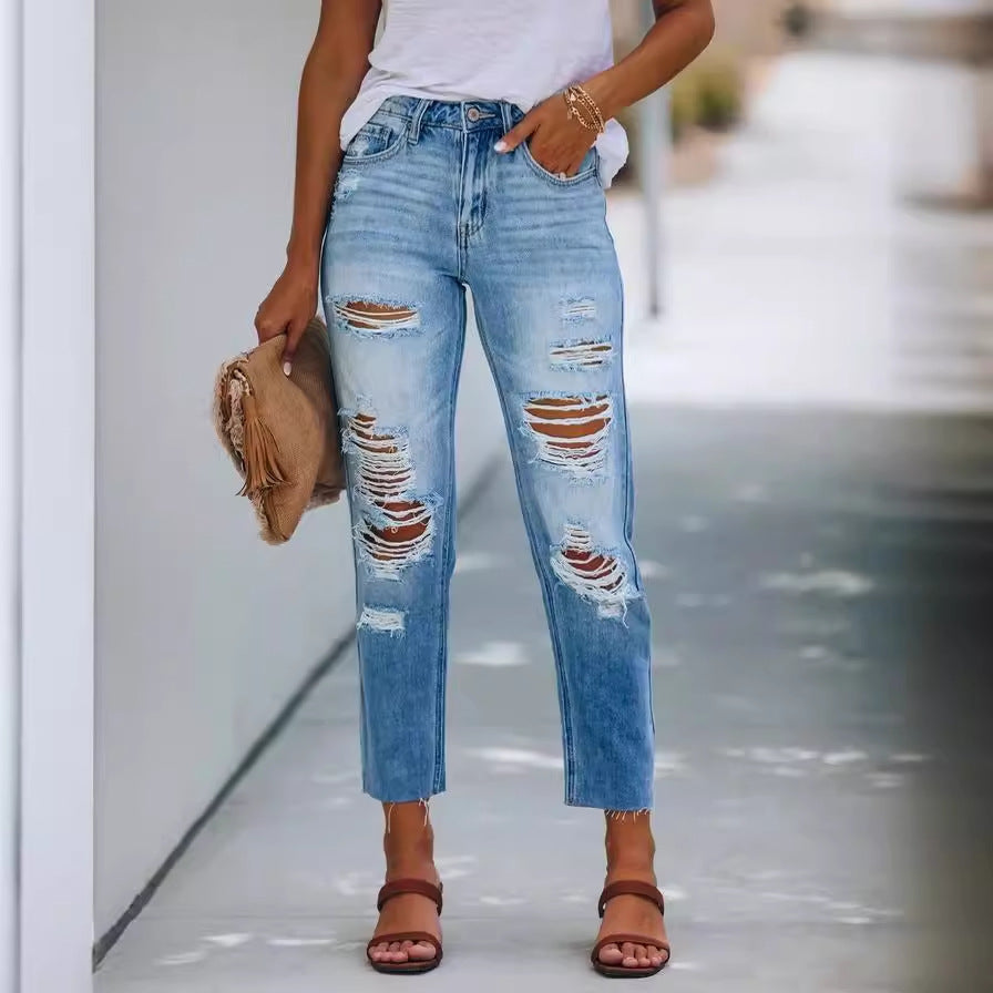 Damer slitte jeans i løs pasform med modetrends detaljer