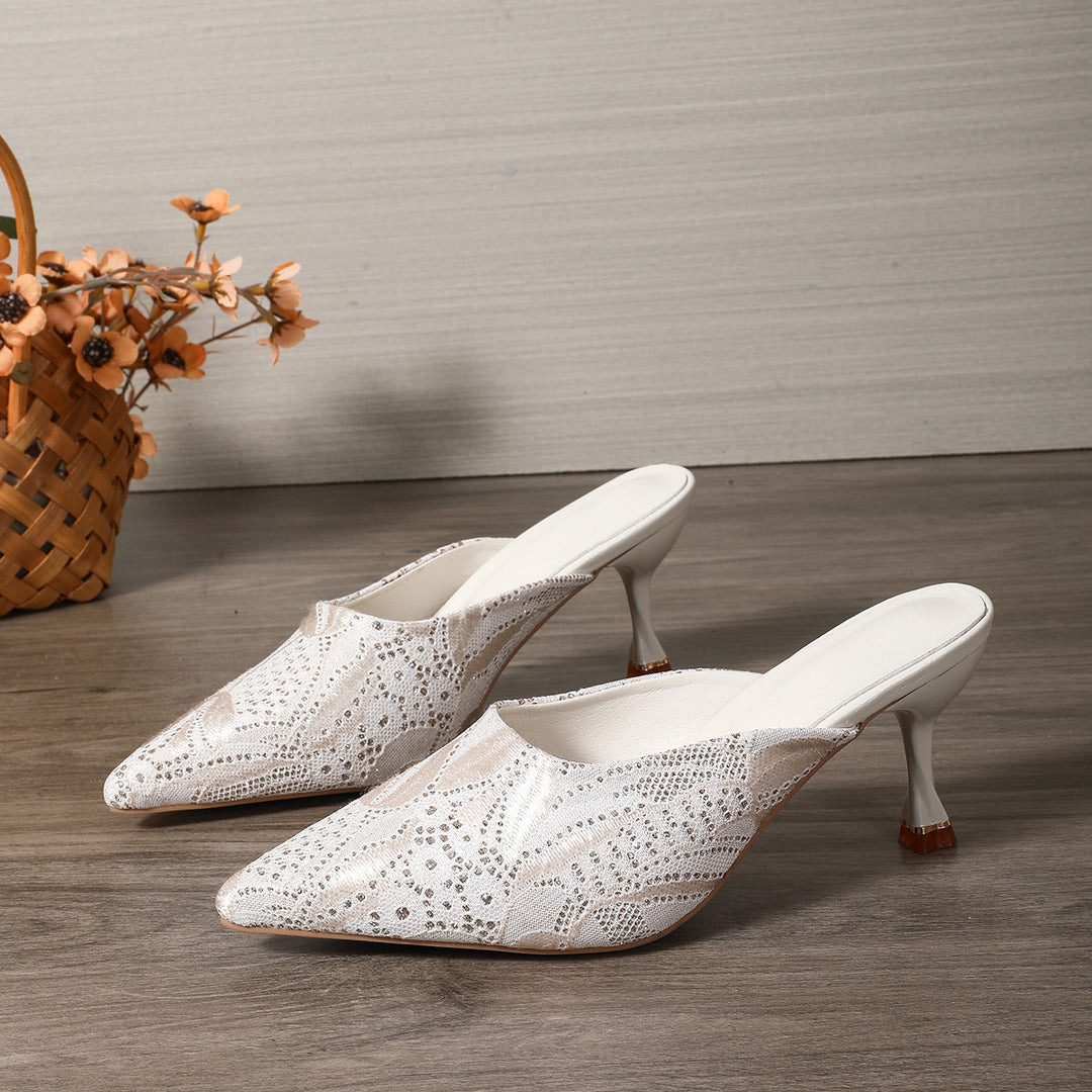 Damer Elegant Pantolette med filigran spidsmønster og stilfuld hældesign Stilla