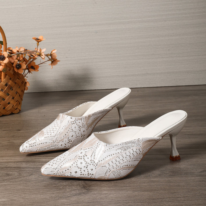 Damer Elegant Pantolette med filigran spidsmønster og stilfuld hældesign Stilla