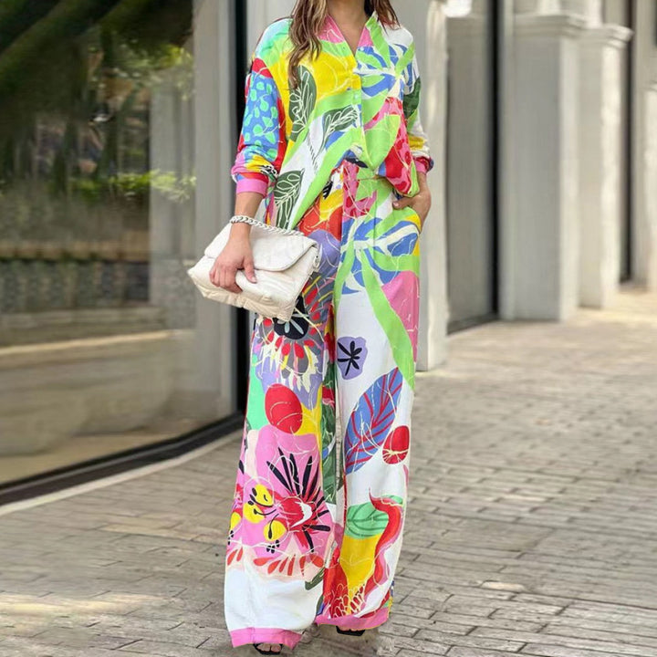Kvinders elegante to-delt jumpsuit med farverigt blomstermønster og løs pasform Stilla