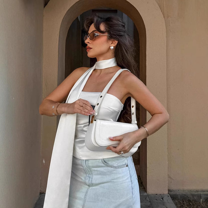 Dame Satin-top med elegant halterdesign og legende sløjfeaccent Stilla