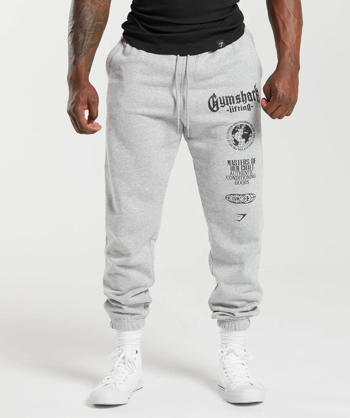 Herre nan konisk skåret bomuldsfleece-sweatpants med elastisk snoretræk ribbede benafslutninger og stort logotryk Skovae