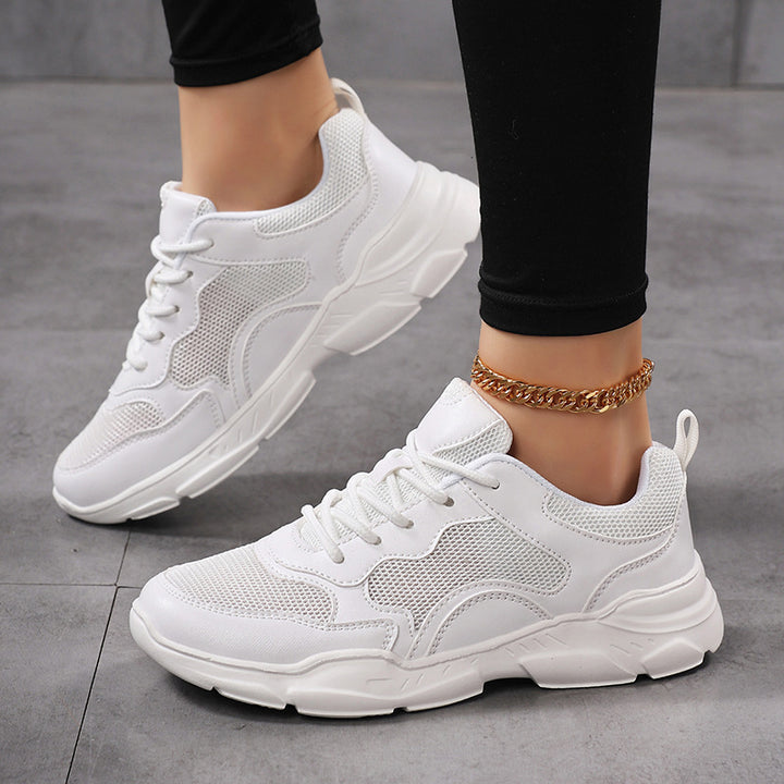 Dame nan moderne komfort sneakers i retro-look med åndbart mesh, polstret hæl og profileret let sål konstruktion Skovae