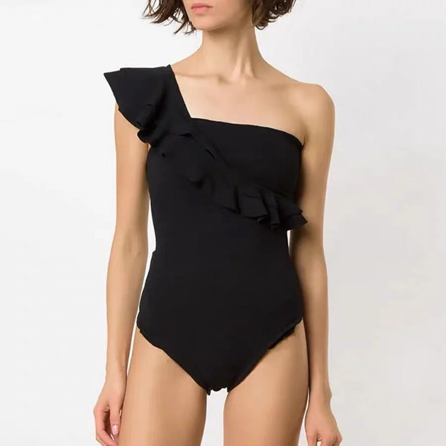 Dame badedragt med asymmetrisk flæse og matchende sarong Stilla