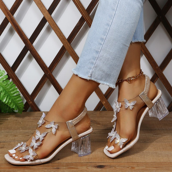 Dame glamourøse sandaler med funklende sommerfugledetaljer og transparent blokhæl Stilla