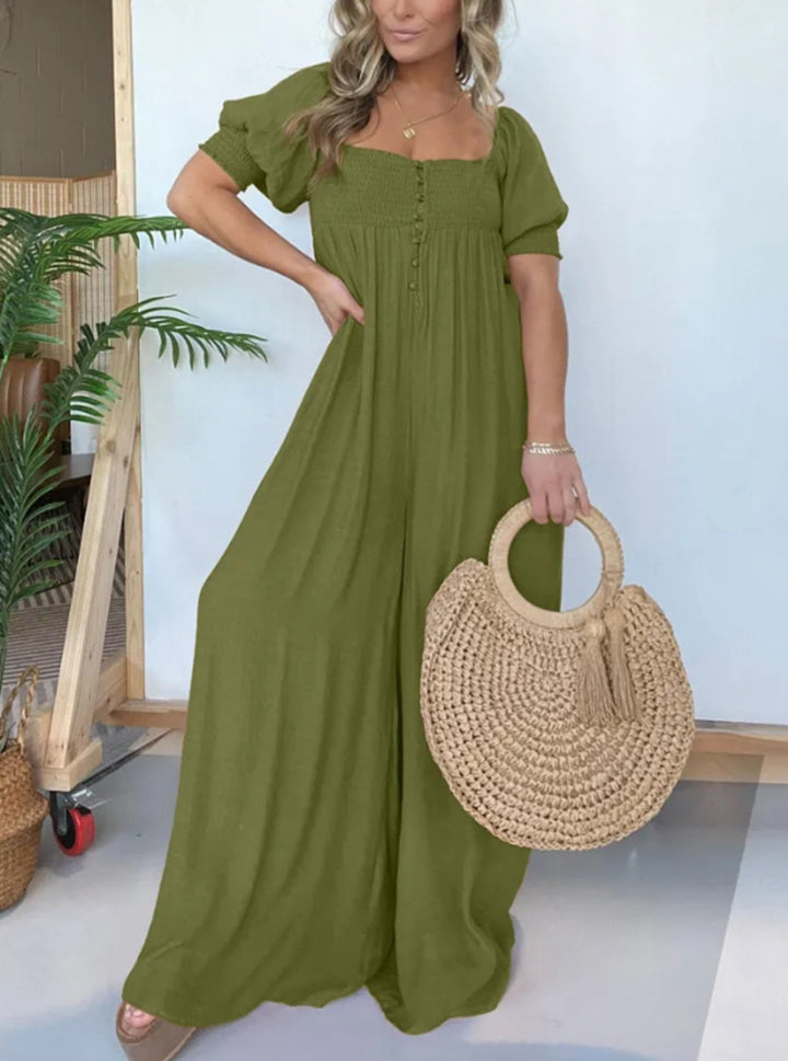 Dame afslappet jumpsuit med smalle stropper og knapdetalje Stilla