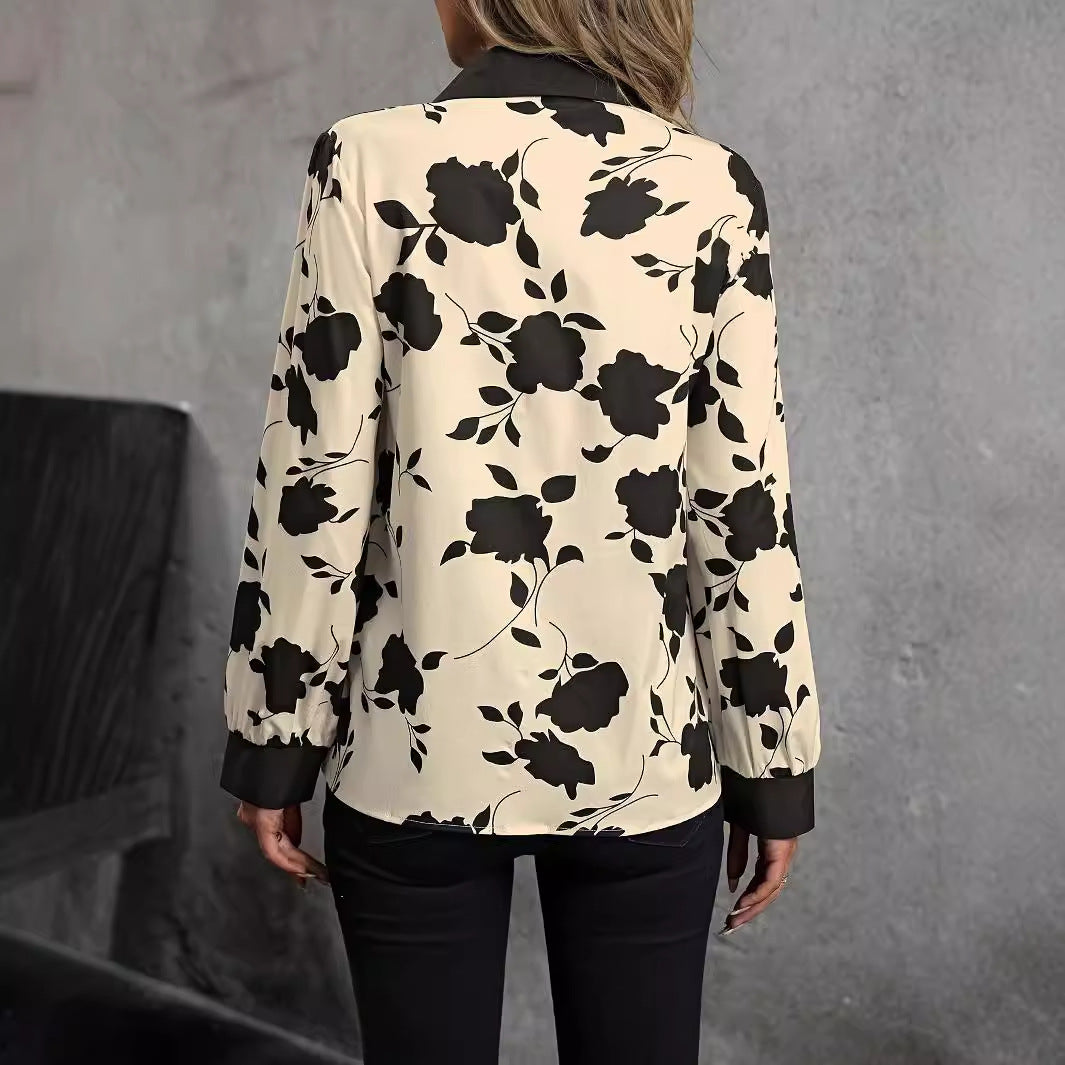 Damebluse i elegant blomsterdesign med moderne krave Stilla