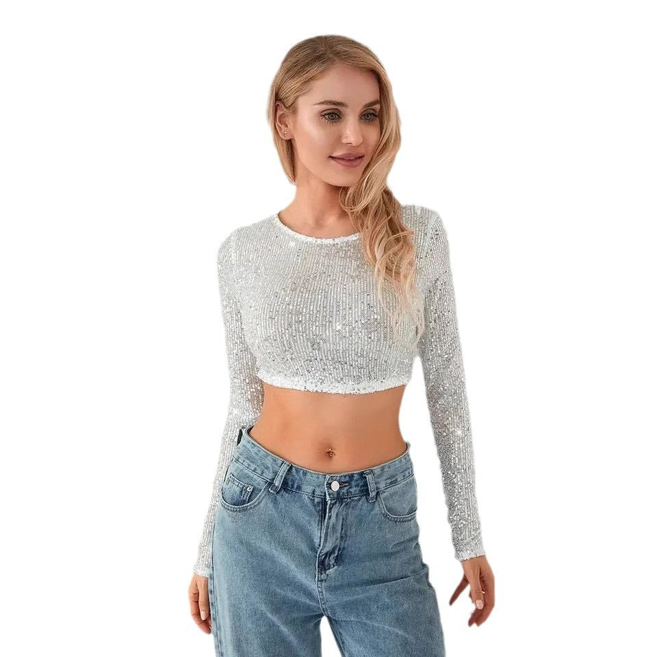 Kvindernes glitrende crop top med lange ærmer og tætsiddende pasform