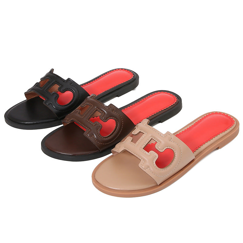 Dame mode slippers med iøjnefaldende logo Stilla