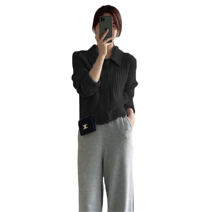 Dame cardigan med elegant knaplukning og ultramoderne ribbet design Stilla