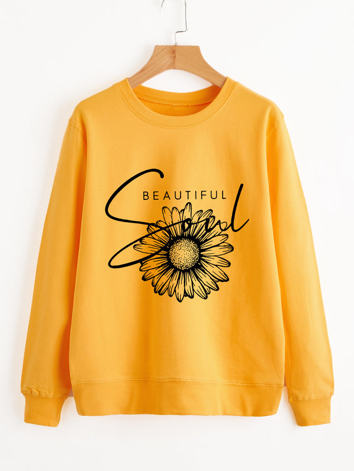 Kvindes sweatshirt med blomstermotiv og inspirerende tekst Stilla