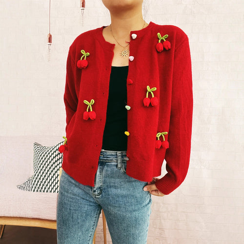 Kvinders cardigan med blomsterdesign og farverige knapdetaljer Stilla