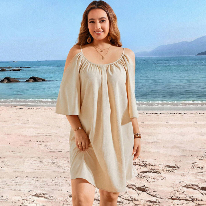 Dame let strandkjole med off-shoulder design og brede ærmer Stilla
