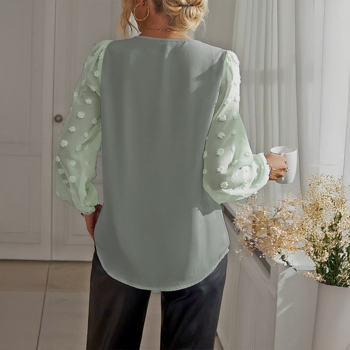 Damebluse med V-hals og gennemsigtige puffærmer Stilla