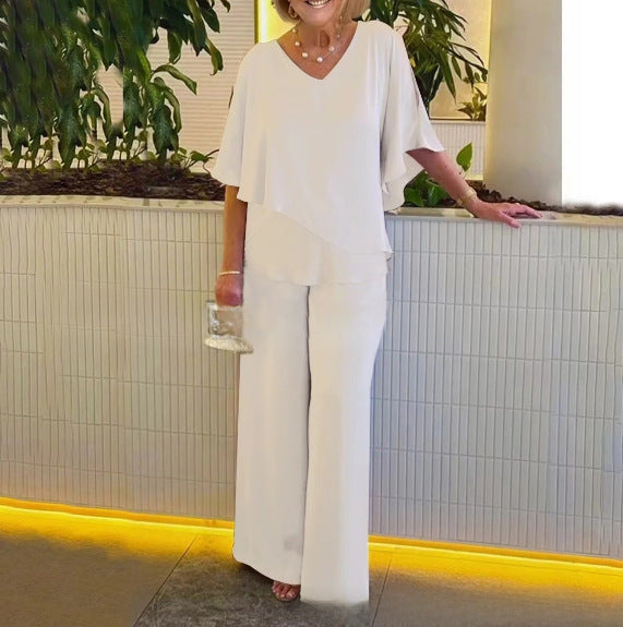 Dame elegant to-delt outfit med flydende snit Stilla