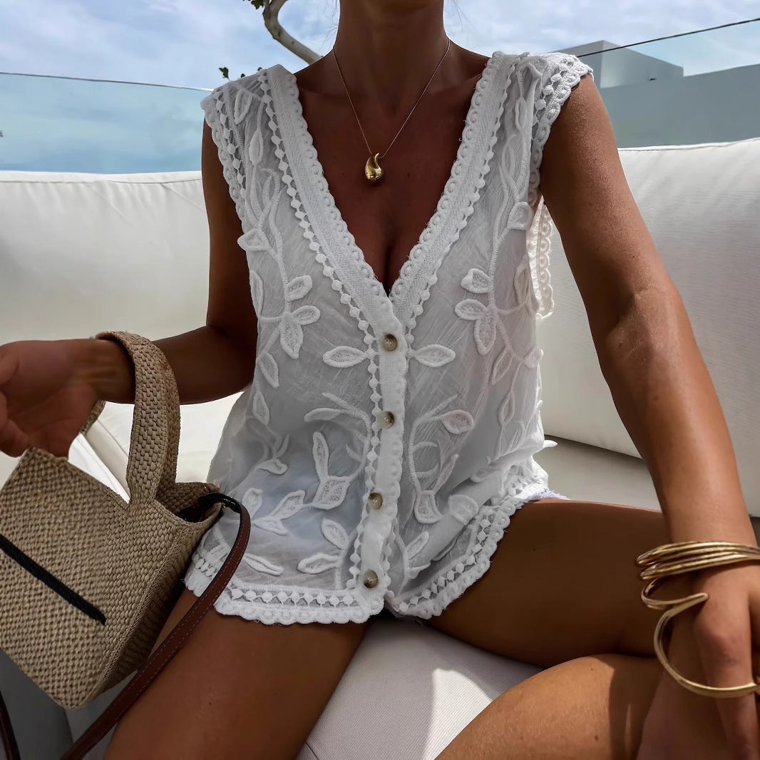 Dame spidsbluse med florale broderier og knapdetaljer Stilla