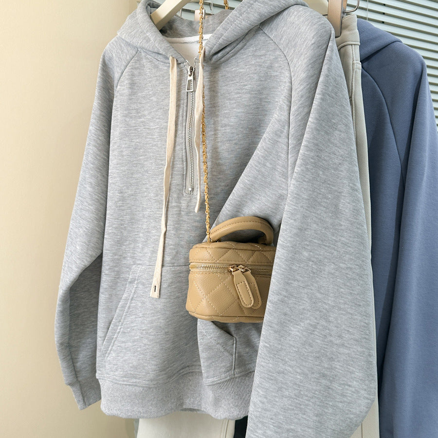 Dame hoodie med lynlås og kængurulomme Stilla