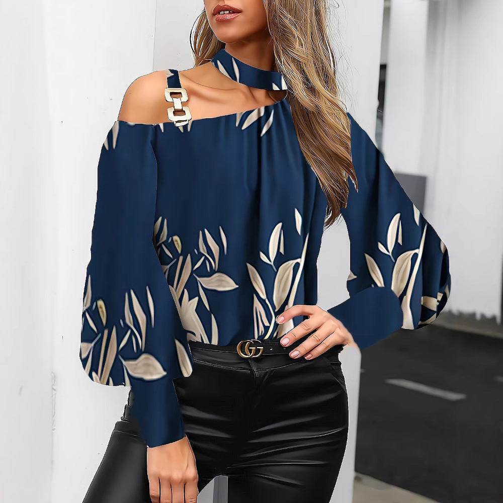 Dame moderigtig top med asymmetrisk snit og florale accenter Stilla